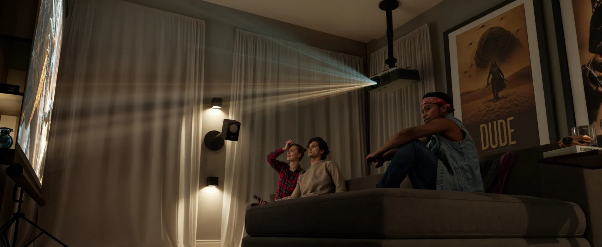 Friends watching a ceiling-mounted projector in a living room